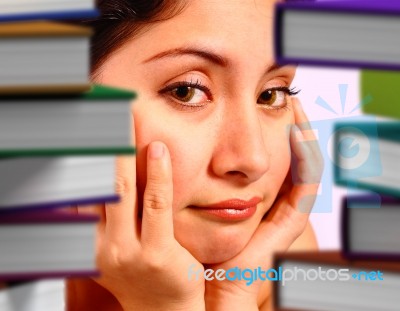Girl Cupping Face With Stacked Book Stock Photo