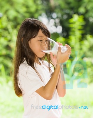 Girl Drinking Milk Stock Photo