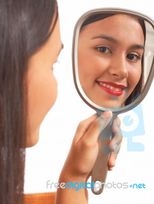 Girl Looking In Mirror Stock Photo