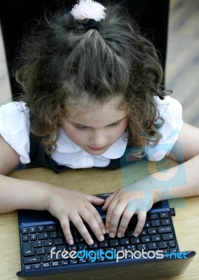 Girl On Computer Stock Photo
