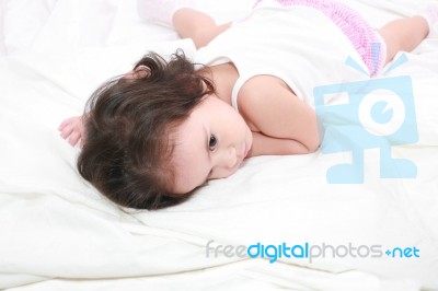 Girl On The Bed Stock Photo
