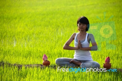 Girl Practicing Yoga Stock Photo
