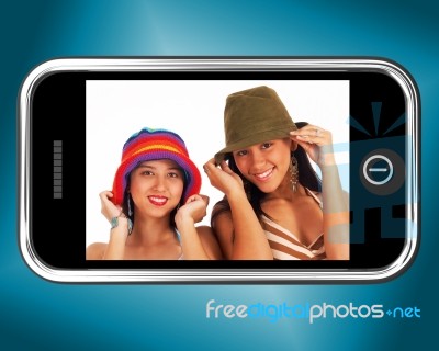 Girls Wearing Hats On Mobile Stock Image