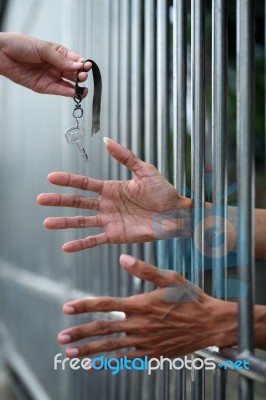 Give A Key To Prisoner Stock Photo