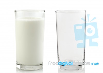 Glass And Glass Of Milk Isolated On White Background Stock Photo