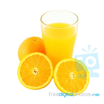 Glass Of Orange Juice And Two Riped Fruit Side On White Background Stock Photo