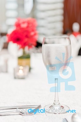 Glass Of Water On Luxury Table Stock Photo