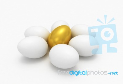 Golden Egg With Chicken Egg Stock Image