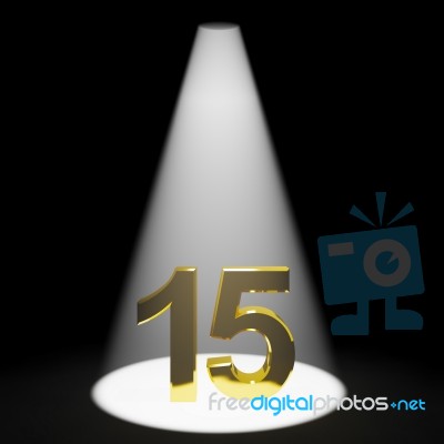 Golden Number 15 With Spotlit Stock Image