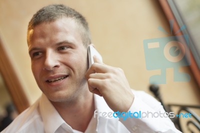Good News! Men Speaking On Phone Stock Photo