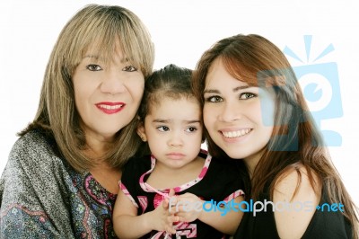 Grandmother With Adult Daughter And Grandchild Stock Photo