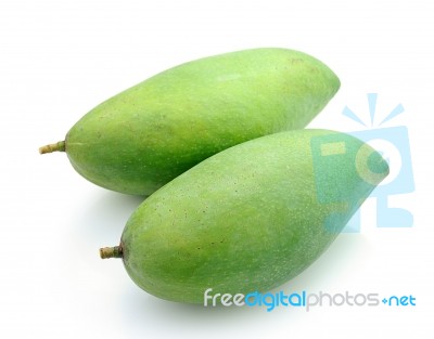 Green Mangoes Isolated On A White Background Stock Photo