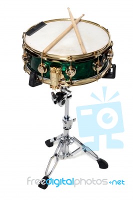 Green Snare And Drum Sticks Stock Photo