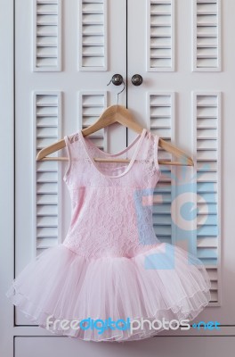 Gril Dress Hang On Wardrobe Stock Photo