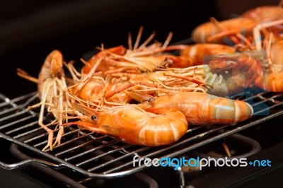 Grilled Prawns On The Grill Stock Photo