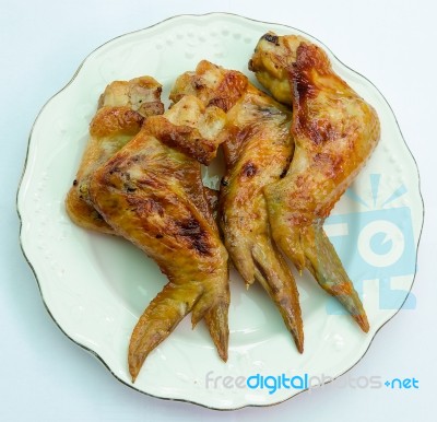 Grilled Wings Chicken  On White Dish Stock Photo