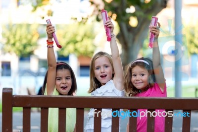Group Of Childrens Having Fun In The Park Stock Photo