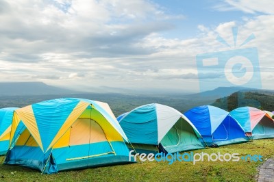 Group Of Tourist Tent On The Hills Stock Photo
