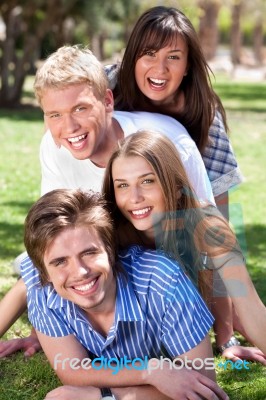 Group Of Young Couples Enjoying Stock Photo