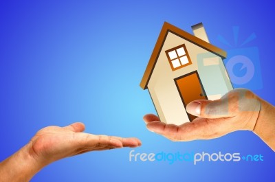 Hand And House Stock Photo