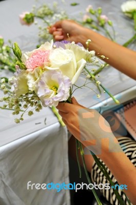 Hand Arranging Flower Stock Photo