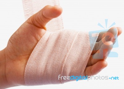 Hand Being Bandaged As Injury Stock Photo
