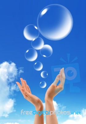 Hand Hold Bubbles In The Sky Stock Photo