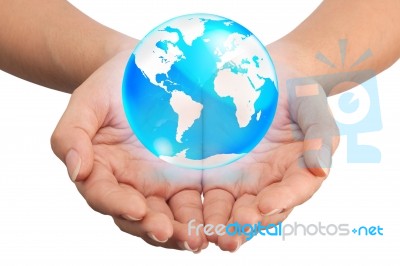 Hand Holding Crystal Globe Stock Photo