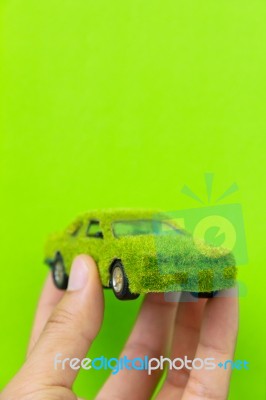 Hand Holding Eco Car Stock Photo