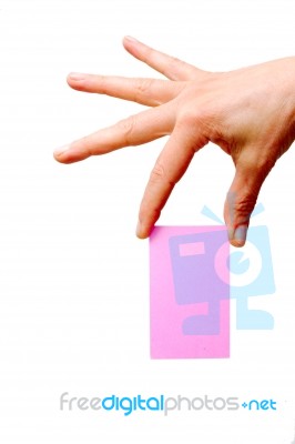 Hand Holding Pink Sheet Stock Photo