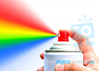 Hand Holding Spray With Rainbow Stock Photo