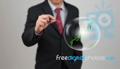 Hand Hole Needle With Stock Chart In Bubble Stock Photo