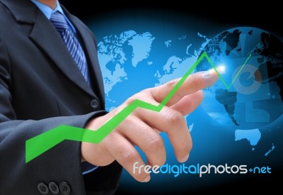 Hand Pushing A Business Graph Stock Photo