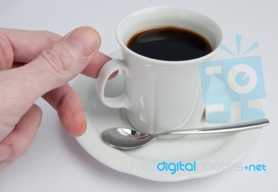 Hand Takes Coffee Cup Stock Photo