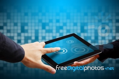 Hand Touch The PC Tablet Stock Photo