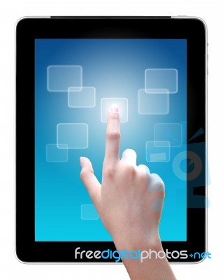 Hand touching ipad screen Stock Photo