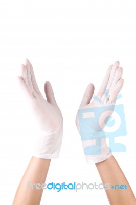 Hand Wearing Surgical Gloves Stock Photo
