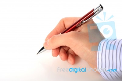 Hand With Red Pen Stock Photo