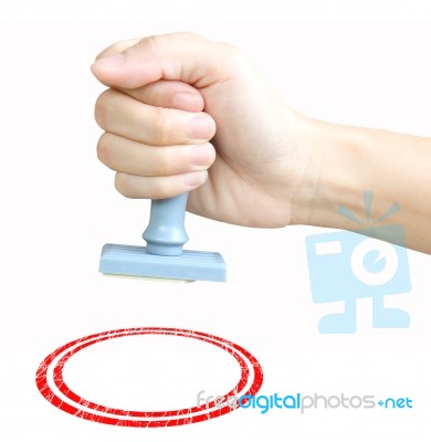 Hand With Rubber Stamp Stock Photo