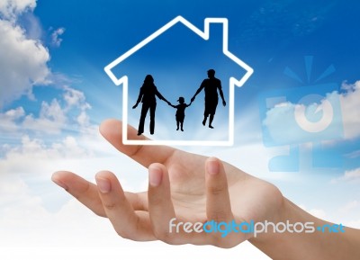 Hand With Silhouettes Family Stock Photo