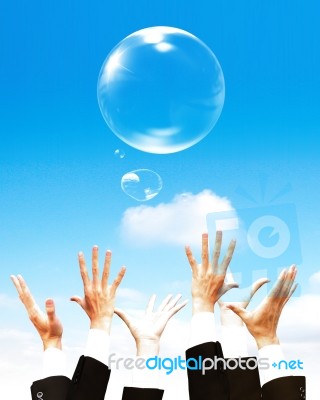 Hands Holding Bubbles On Sky Stock Photo