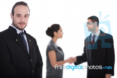 Handsome Business Man Looking At Us Stock Photo