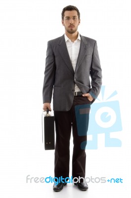 Handsome Businessman Standing With His Office Bag Stock Photo