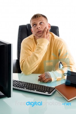 Handsome Guy In Thinking Pose Stock Photo