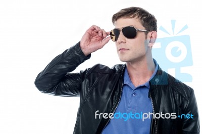 Handsome Man In Leather Jacket Looking Away Stock Photo