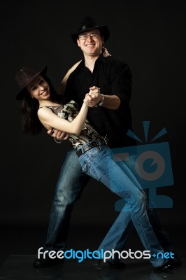 Handsome Young Couple Dancing In Studio Stock Photo