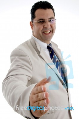 Happy Businessman Offering Hand Shake Stock Photo