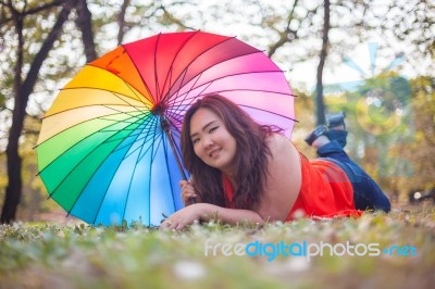 Happy Woman With Umbrella Stock Photo