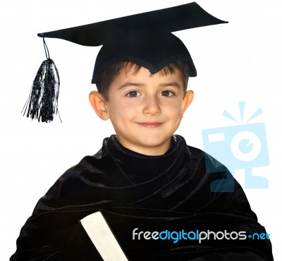 Happy Kid Graduate With Graduation Cap Stock Photo