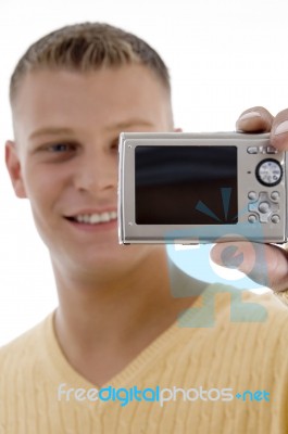 Happy Man Holding Digital Camera Stock Photo